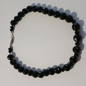 Faceted glass black beaded necklace.